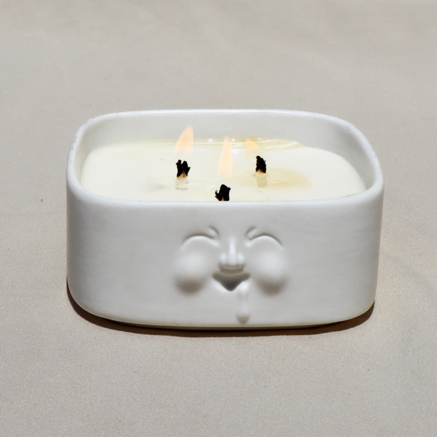 vela aromática en porcelana